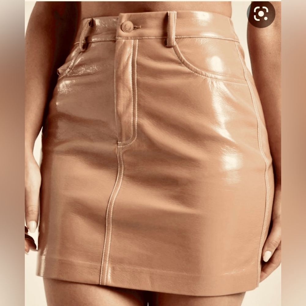 THESE THREE BOUTIQUE Shiny Faux
Patent Leather Tan Mini Skirt